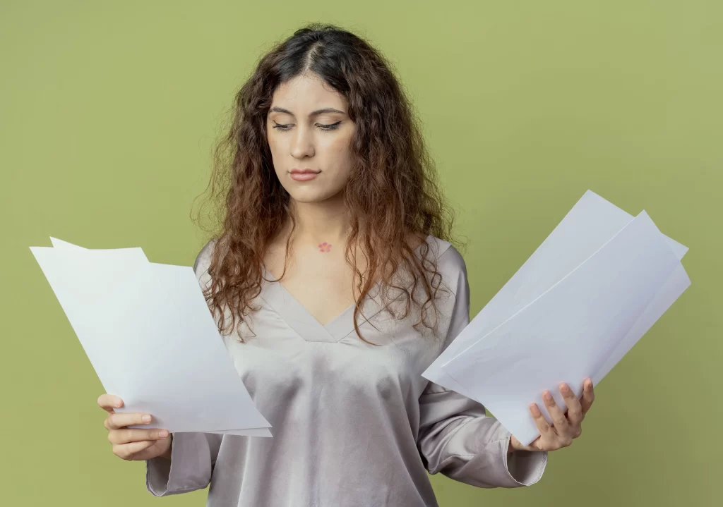 decorative image woman thinking with documents