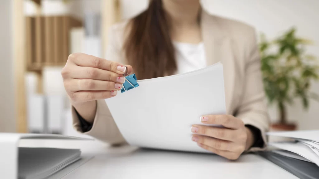 decorative image woman organizing documents